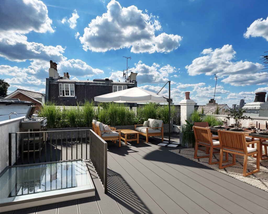 A patio with chairs and a table on a rooftop