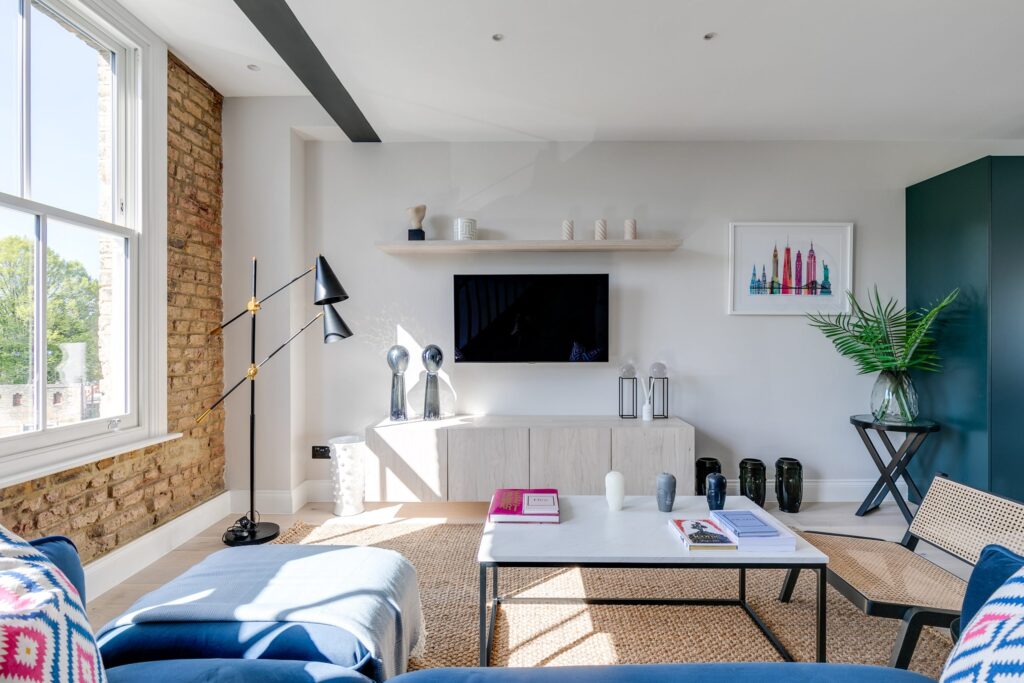 A bright living room with a TV