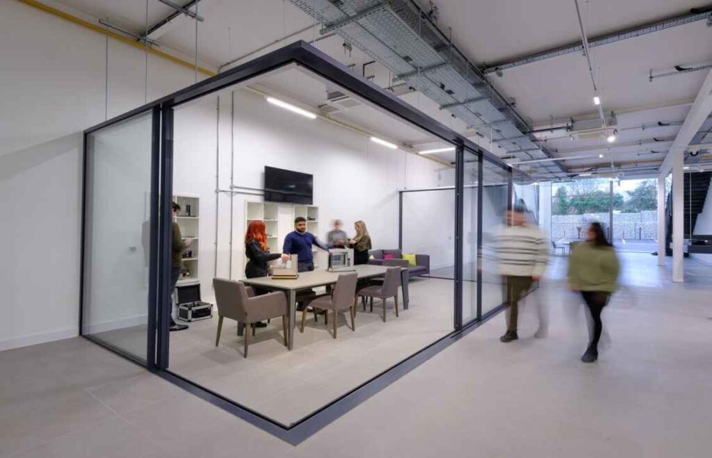 People in a glass office