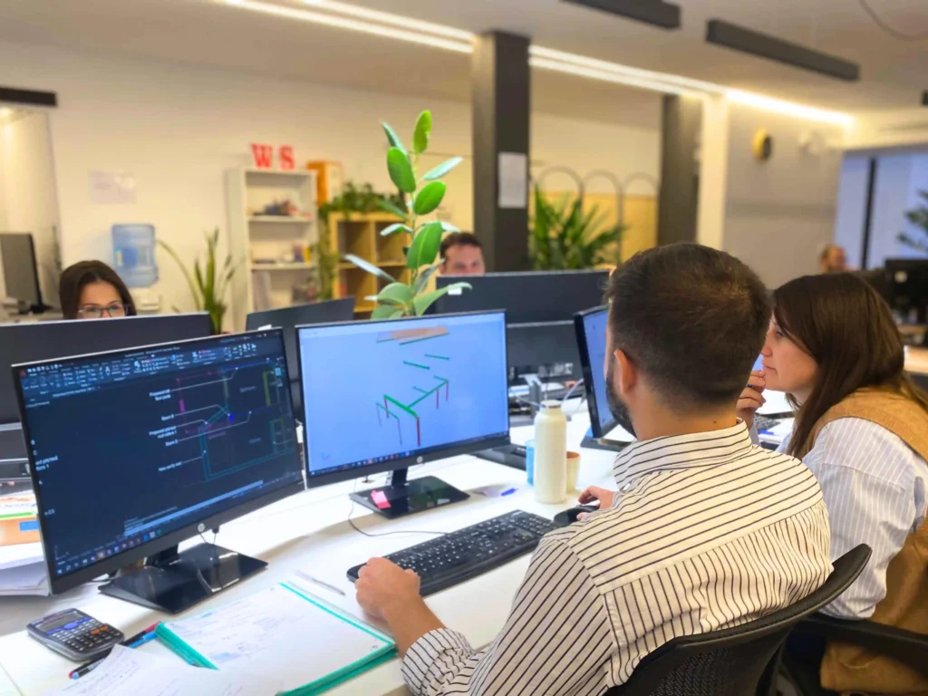 A male and a female structural engineers working on a project